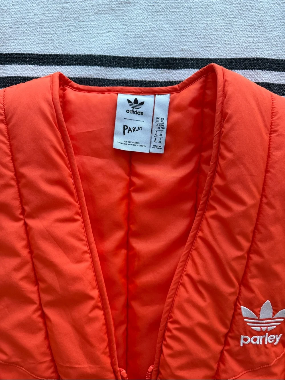Adidas x Parley Orange Puffer Vest Women’s XL